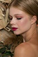 Closeup portrait of young beautiful woman with a healthy skin of the face. photo