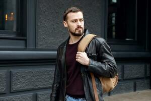 Fashionable man posing in old city photo