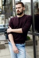 Fashionable man posing in old city photo