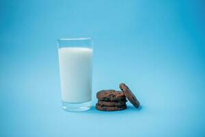 Cookies with chocolate chips on a plate on a table photo