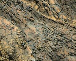 a close up of the rock surface photo