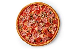 Juicy pizza with mozzarella and pelati sauce topped with sausages, mushrooms, onions isolated on white photo