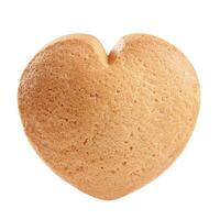 Closeup of heart shaped butter cookie isolated on white background photo