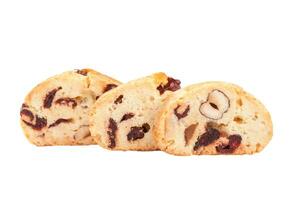 Cantucci biscuits with dried cranberries and hazelnuts isolated on white photo