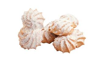 Butter shortbread swirl biscuits sprinkled with powdered sugar on white background photo