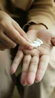 top view of women hand taking medical tablet video