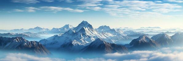 Panoramic view of snow capped summit at sunrise background with empty space for text photo