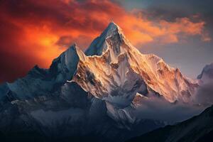 Sunset paints vibrant hues on a frost capped mountain under a climbers look photo