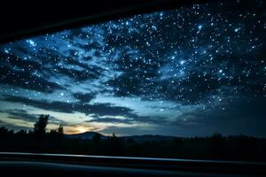 Starry night skies viewed through vans rooftop window background with empty space for text photo