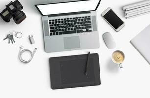 Minimal work space Laptop, camera, coffee, camera, pen, pencil, notebook, smartphone, stationery on white background for copy space. photo