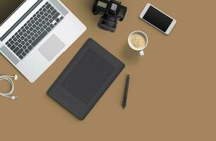 Minimal work space Laptop, camera, coffee, camera, pen, pencil, notebook, smartphone, stationery on brown background for copy space. photo