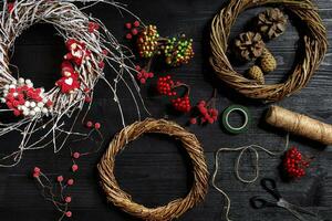 Make a Christmas wreath with your own hands. Workplace for preparing handmade decorations. photo