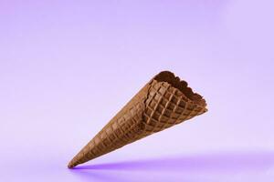 Empty. crispy, chocolate wafer cone for ice cream.  treats. template for advertising and design. photo