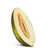 Half of delicious green tendral melon in cross-section, isolated on white background with copy space for text or images. Side view. Close-up shot. photo