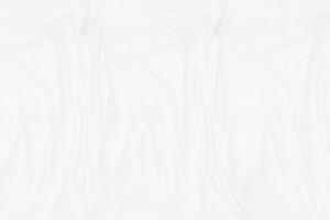 Top view Abstract White cloth background with soft waves.Wave and curve overlapping with different shadow of color,white fabric, crumpled fabric. photo