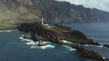 aérien vue de punta de teno phare sur Tenerife île, Espagne. magnifique paysage de rocheux Tenerife côte avec historique phare, canari îles, Espagne video