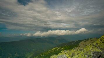 Time lapse of beautiful clouds move over the mountains video