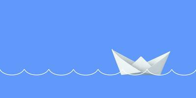 White paper boat sailing on the ocean. banner copy space background photo