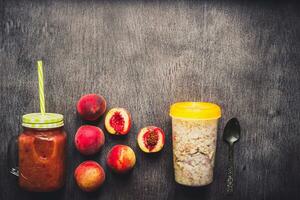 Fruit Smoothies. Peach smoothie. Peach and oatmeal. Delicious and healthy breakfast. Toned photo