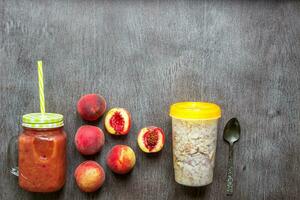 Fruit Smoothies. Peach smoothie. Peach and oatmeal. Delicious and healthy breakfast photo