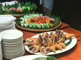 jajanan pasar is traditional Indonesian snack that often found in traditional market photo