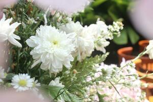 the wedding ceremony in the open air of fresh flowers, with candles. gentle and beautiful wedding decor for newlyweds photo