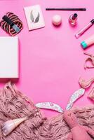 Girl's accessories on a pink background photo