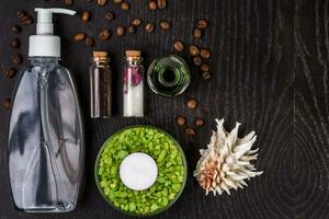 soaps, bath salt, mask on wood table background. spa photo