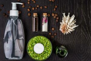 soaps, bath salt, mask on wood table background. spa photo