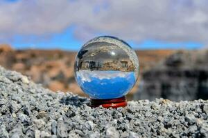 Snow globe on the gravel photo