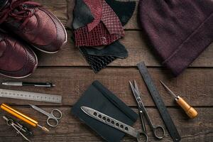 Leather crafting. Tools flat lay still life photo