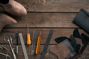 Leather crafting. Tools flat lay still life photo