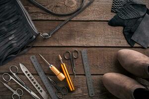 Leather crafting. Tools flat lay still life photo