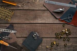 Leather crafting. Tools flat lay still life photo