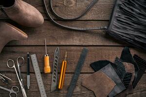 Leather crafting. Tools flat lay still life photo