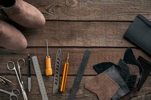 Leather crafting. Tools flat lay still life photo