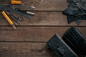 Leather crafting. Tools flat lay still life photo