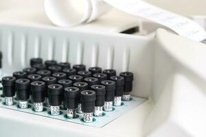 Test tubes arranged on medical trolley photo