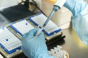 A chemical sample bottle. Centrifuge. A test tube vial sets for analysis. photo