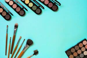 The women's cosmetics set on a blue background, modern woman. photo