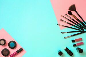 The women's cosmetics set on a blue background, modern woman. photo