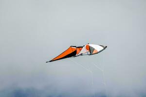 a kite flying in the sky photo