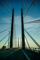 a view of the bridge from the back of a car photo