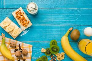 Top view of toast with butter and fruits photo