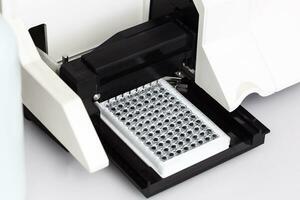 A chemical sample bottle. Centrifuge. A test tube vial sets for analysis. photo