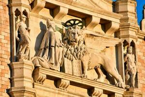 the lion on the facade of the building photo