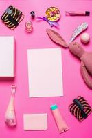 Girl's accessories on a pink background photo