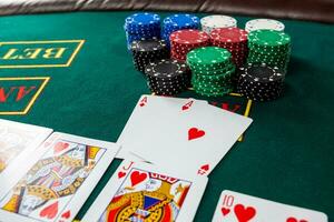 Poker play. Chips and cards photo