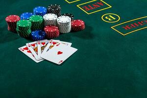 Poker play. Chips and cards photo