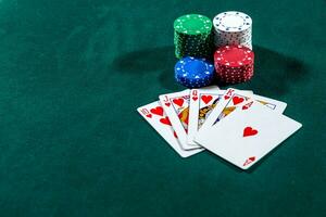 Poker play. Chips and cards photo